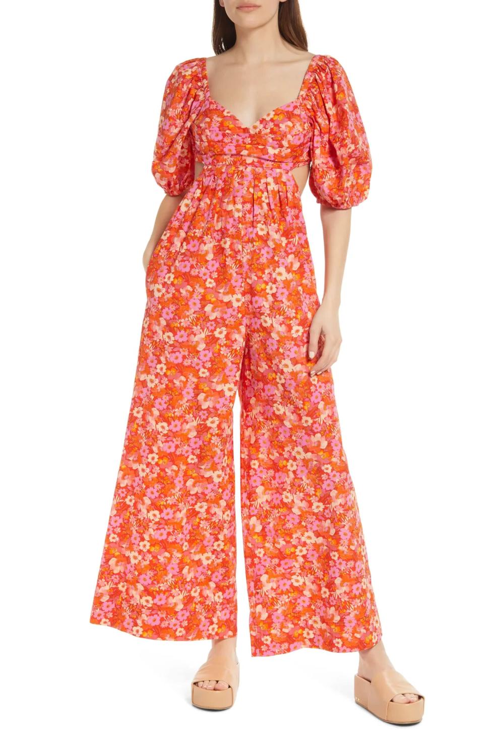 <p>Headed to brunch or wine tasting? This gorgeous <span>Free People Amy Floral Cotton Jumpsuit</span> ($100, originally $168) looks great with sandals. Make sure to check out the back as well - it has a cute strappy detail.</p>