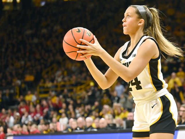 <p>Keith Gillett/Icon Sportswire via Getty </p> Iowa guard Gabbie Marshall sets up a shot in January 2024.