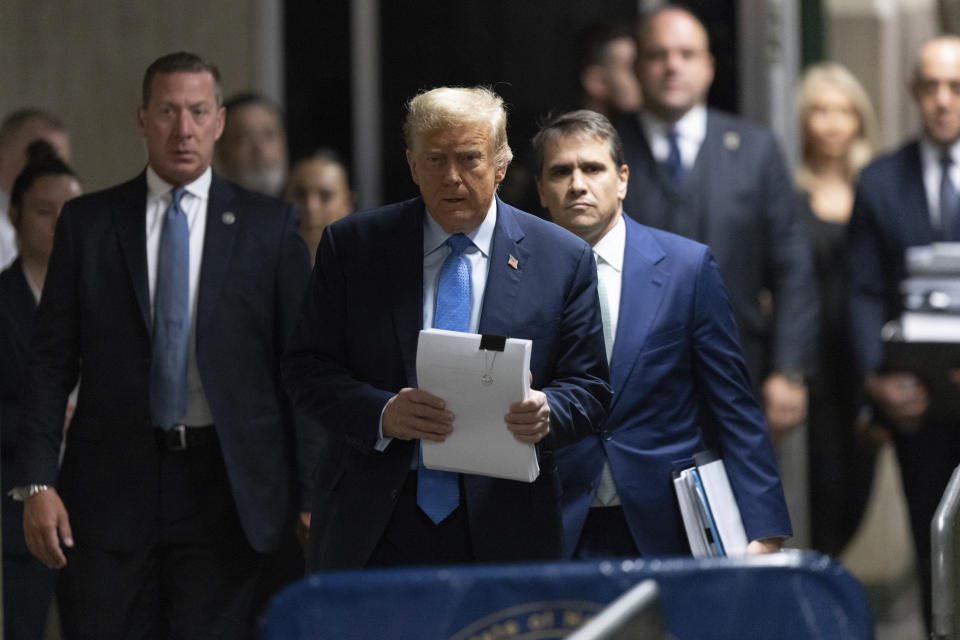 Former President Donald Trump arrives at Manhattan criminal court before his trial in New York, Friday, April 26, 2024. (Jeenah Moon/Pool Photo via AP)