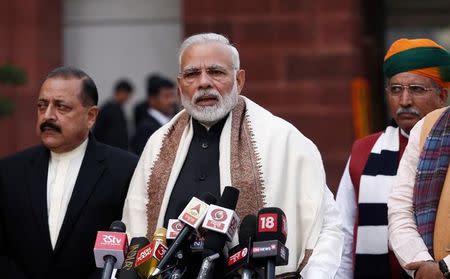 Prime Minister Narendra Modi speaks with the media inside the parliament premises on the first day of the budget session, in New Delhi, India, January 29, 2018. REUTERS/Adnan Abidi/Files