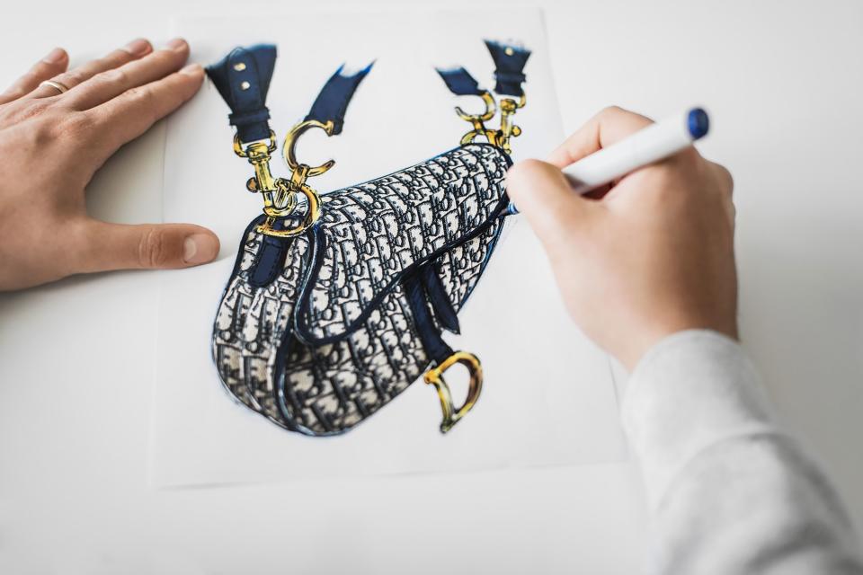 Maria Grazia Chiuri’s new twist on the iconic saddlebag is launching in Dior boutiques today. Here, the house shared exclusive photos and videos to show how each one is made.