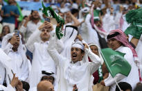 Saudi Arabia fans celebrating after their team scored during the World Cup group C soccer match between Argentina and Saudi Arabia at the Lusail Stadium in Lusail, Qatar, Tuesday, Nov. 22, 2022. (AP Photo/Natacha Pisarenko)