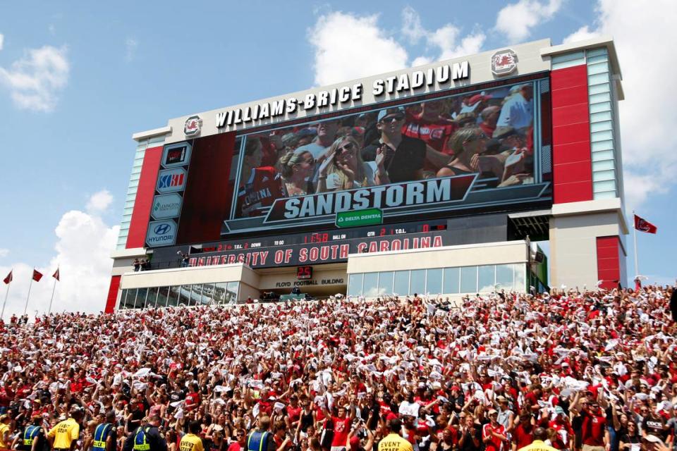 USC fans lift their towels as Sandstorm plays in the first quarter of the Gamecocks game against East Carolina at Williams-Brice Stadium.