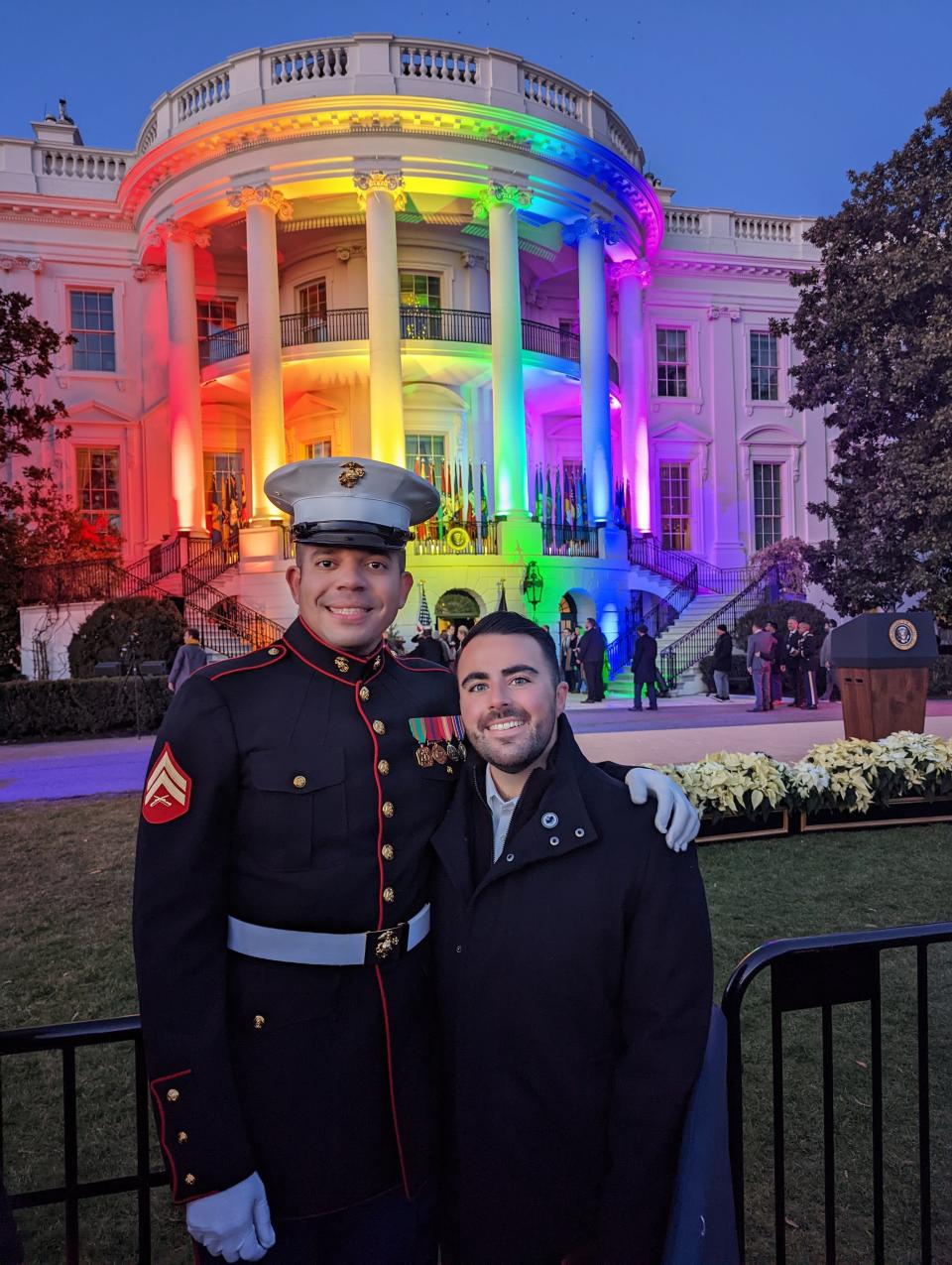 Christian Fuscarino, right, and his husband, Aaron Williams, pose outside the White House in Washington, D.C. on Tuesday, Dec. 13, 2022 before President Joe Biden signed the Respect for Marriage Act.