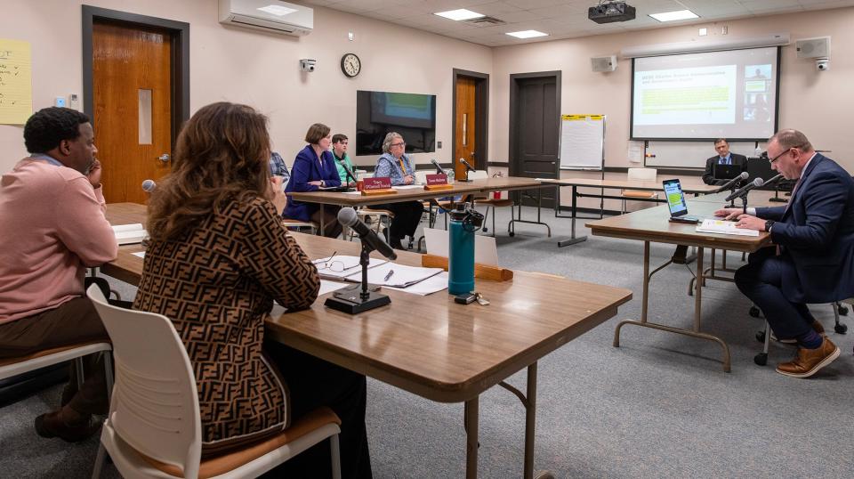 Worcester School Committee members listen to Deputy Superintendent Brian Allen, right, during Monday's special meeting in the Dr. John E. Durkin Administration Building.