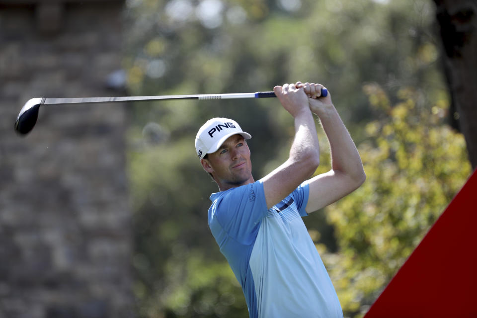 Victor Perez of France tees off for the HSBC Champions golf tournament at the Sheshan International Golf Club in Shanghai on Friday, Nov. 1, 2019. (AP Photo/Ng Han Guan)