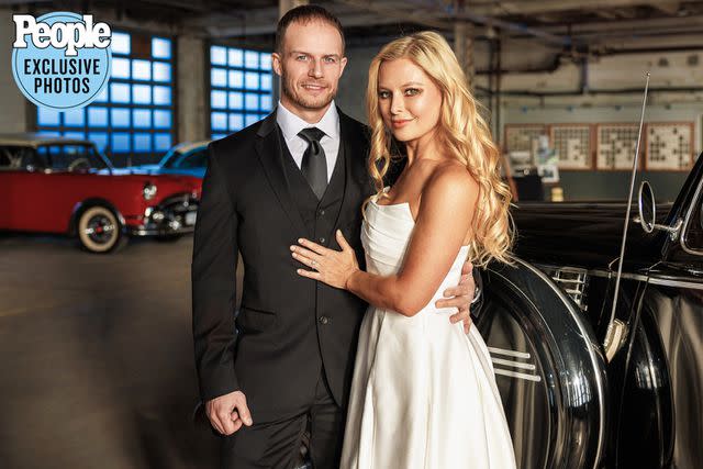 <p>Ben Wagner Photography</p> Cristy Lee and John Hawkins pose at their wedding