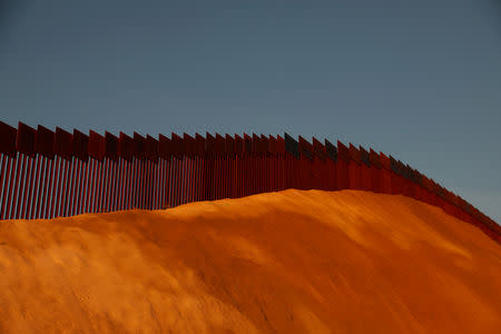 FILE PHOTO: The U.S. and Mexico border fence is seen in Tijuana, Mexico, Jan. 27, 2019. REUTERS/Shannon Stapleton/File Photo