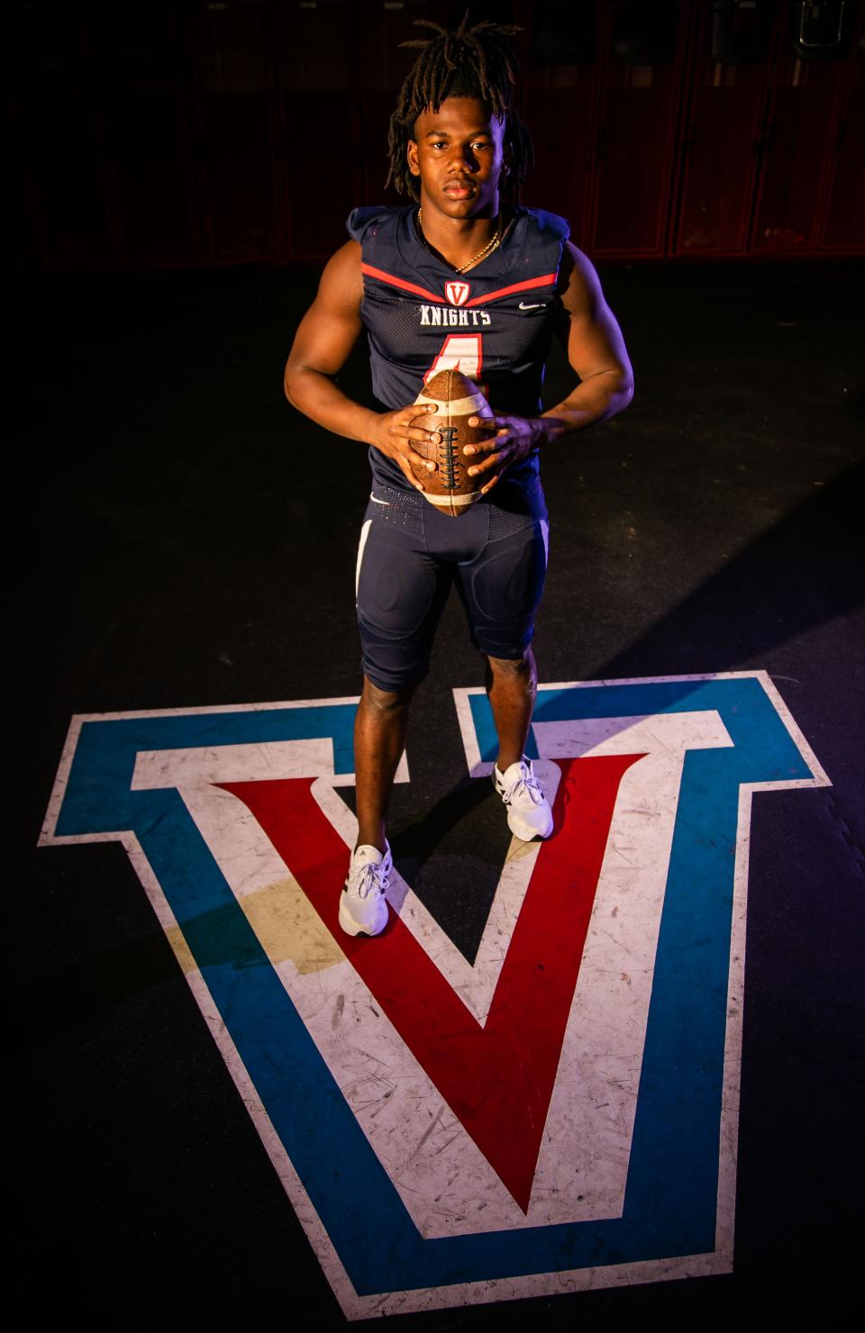 Vanguard High School's Quarterback and Safety, Fred Gaskin, is this year's Ocala Star Banner Overall Football Player of the Year. He posed for portraits Tuesday afternoon, February 15, 2022 in the locker room at the field house at Vanguard High School.