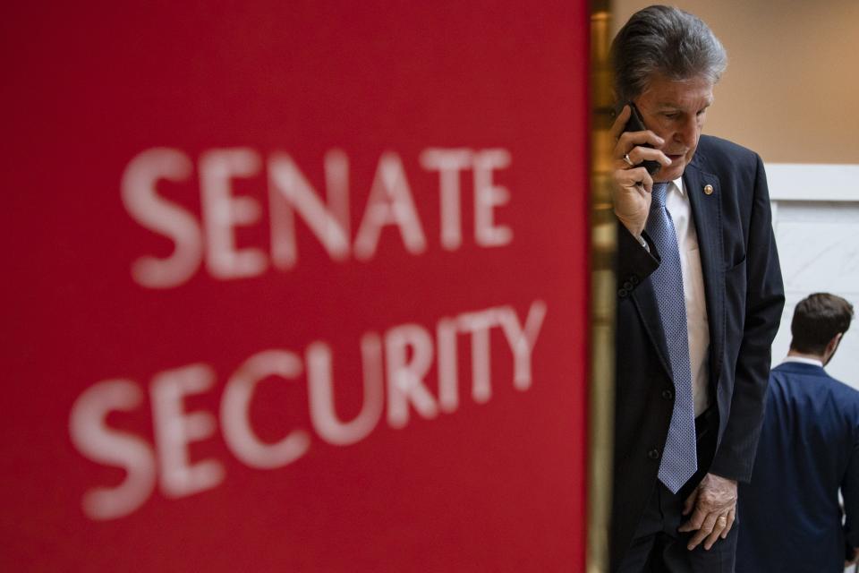 Senator Joe Manchin leaves a briefing in Washington, DC., on March 10, 2020.