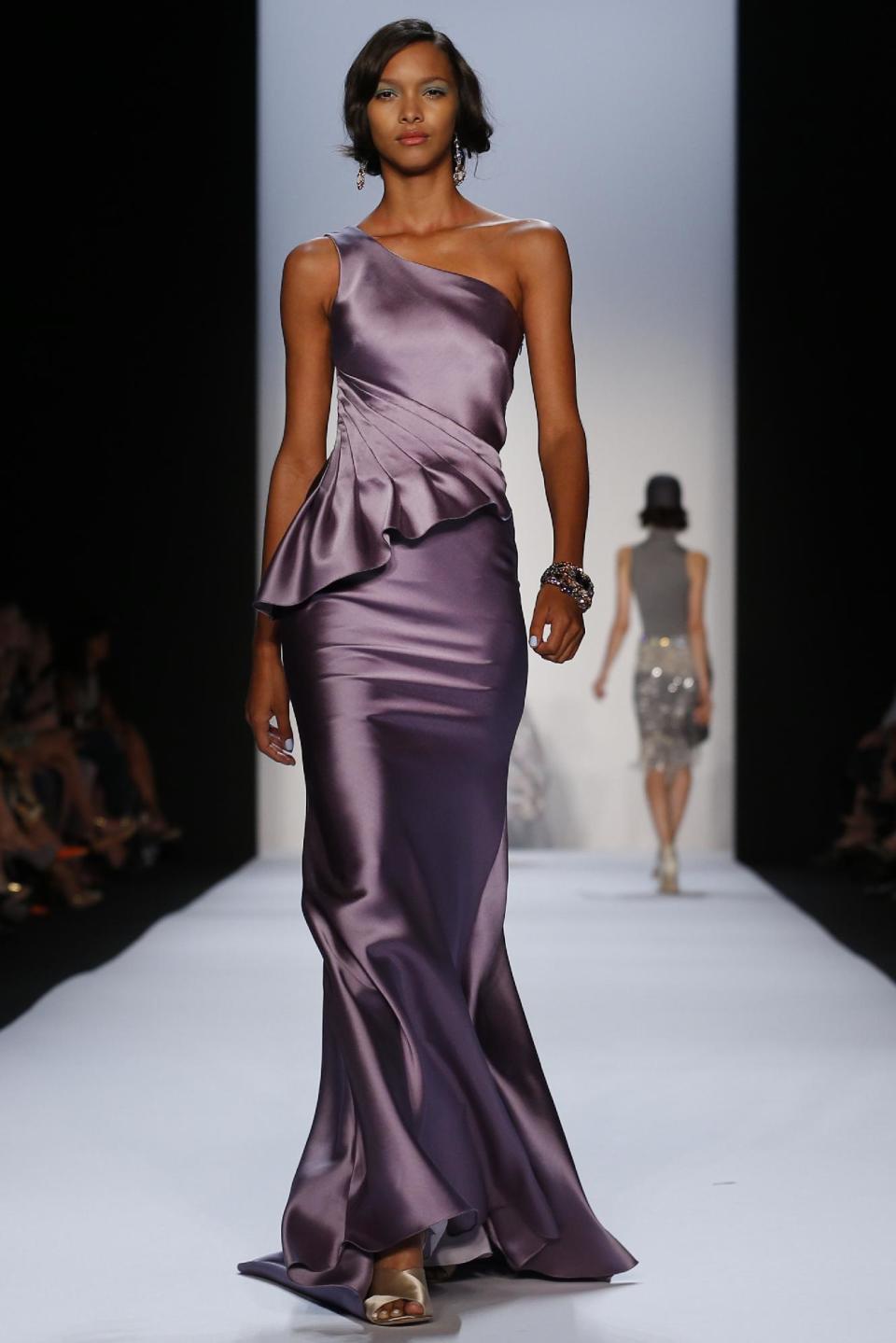 The Badgley Mischka Spring 2014 collection is modeled during Fashion Week in New York, Tuesday, Sept. 10, 2013. (AP Photo/John Minchillo)