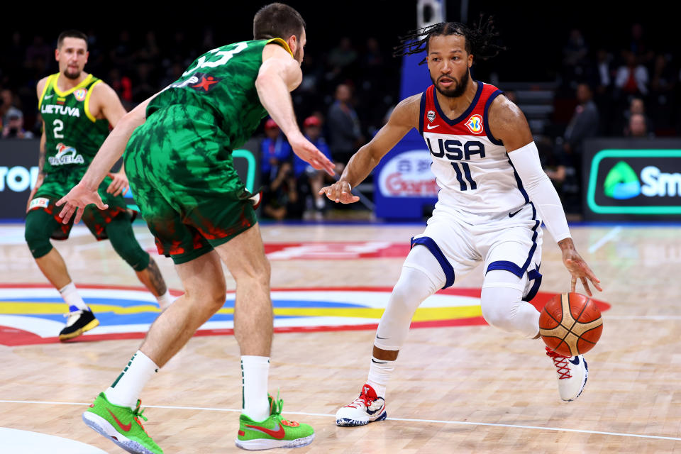 MANILA, PHILIPPINES - SEPTEMBER 03: Jalen Brunson #11 of the United States controls the ball against Tomas Dimsa #33 of Lithuania in the fourth quarter during the FIBA Basketball World Cup 2nd Round Group J game at Mall of Asia Arena on September 03, 2023 in Manila, Philippines. (Photo by Yong Teck Lim/Getty Images)