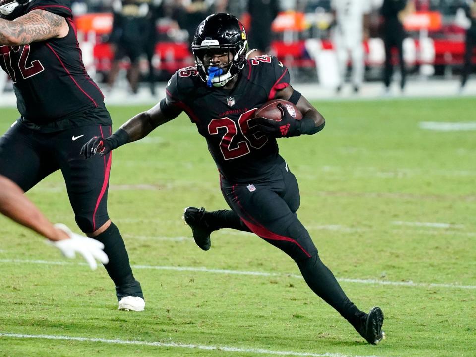 Eno Benjamin runs with the ball against the New Orleans Saints.