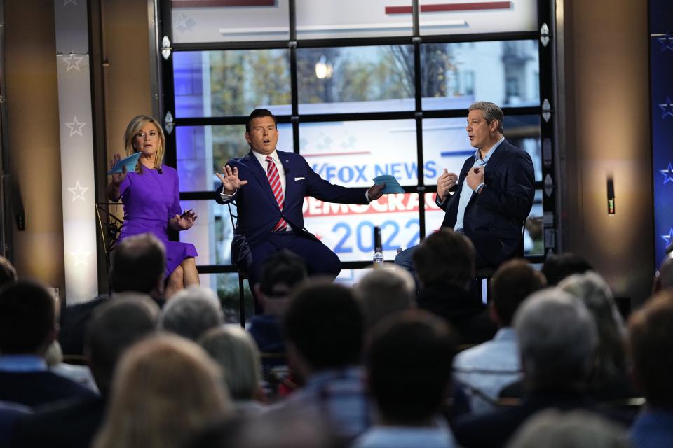 Fox News hosts Bret Baier and Martha MacCallum question U.S. Senate candidate Tim Ryan during a town hall in Columbus on Tuesday, Nov. 1, 2022.