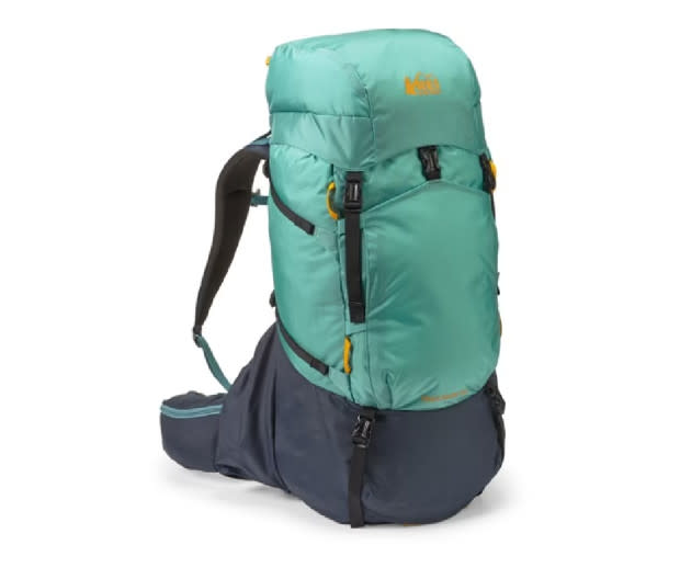 <p>REI’s Trailmade collection aims for size inclusivity and approachability. The Trailmade 60-liter pack reflects that push for accessibility. Instructions are printed on the inside lid. It accommodates torsos from 17 to 21 inches and waists from 32 to 58 inches across two different sizes. In our tests, Trailmade offered the most comfortable hip belt and lower back padding. It also easily carried a heavy 50-pound load-out while offering the easiest access to <a href="https://www.mensjournal.com/gear/best-water-bottles-running-working-out-commuting-and-more" rel="nofollow noopener" target="_blank" data-ylk="slk:water bottles;elm:context_link;itc:0;sec:content-canvas" class="link ">water bottles</a>, with its low-mounted, angled water bottle pockets.</p><p>The pronounced back curvature won’t fit everyone and, when wet, it has a tendency to slip a bit. While the water bottle pockets are easy to access, they leave room for mesh side pockets that aren’t there. </p><p>Nevertheless, the spacious compartments and the fact that REI locations will fit you and allow you to test the pack out, all but make this the most comfortable and beginner-friendly pack on the market.</p><ul><li><strong>Weight: </strong>Regular, 3.38 lbs; Extended: 3.69 lbs</li><li><strong>Capacity: </strong>60 liters</li><li><strong>Best use: </strong>Multi-day trip</li></ul><div><table><thead><tr><th>Pros</th><th>Cons</th></tr></thead><tbody><tr><td><p>👍 Comfortable hip belt and back padding</p></td><td><p>👎 Curved back may be uncomfortable for some</p></td></tr><tr><td><p>👍 Made with recycled materials</p></td><td><p>👎 No mesh side pockets</p></td></tr><tr><td><p>👍 Easy access to water bottles</p></td><td></td></tr></tbody></table></div><p>[$149; <a href="https://www.avantlink.com/click.php?tt=cl&mi=10248&pw=261197&ctc=mensjournal_04-20&url=https%3A%2F%2Fwww.rei.com%2Fproduct%2F217409%2Frei-co-op-trailmade-60-pack-mens%3Fsku%3D2174090004%26CAWELAID%3D120217890015867943%26CAGPSPN%3Dpla%26CAAGID%3D104890971750%26CATCI%3Dpla-415638184522%26cm_mmc%3DPLA_Google%257C21700000001700551_2174090004%257C92700053575955187%257CTOF%257C71700000066695855%26gclid%3DCj0KCQjwk96lBhDHARIsAEKO4xZRLj5YZOgguZuGvVOukGdAn-j2mA1rZ-aoOnA81o6eN5ZuCnUMS3UaAsjLEALw_wcB%26gclsrc%3Daw.ds" rel="nofollow noopener" target="_blank" data-ylk="slk:rei.com;elm:context_link;itc:0;sec:content-canvas" class="link ">rei.com</a>]</p>
