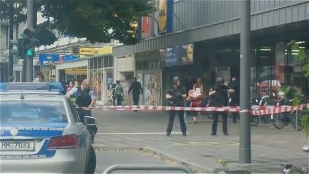 Security forces are seen after a knife attack in a supermarket in Hamburg, Germany, July 28, 2017 in this still image from a video obtained from social media. Twitter/Krakan Gargicz via REUTERS THIS IMAGE HAS BEEN SUPPLIED BY A THIRD PARTY. NO RESALES. NO ARCHIVES. MANDATORY CREDIT