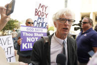Attorney Rob McDuff, an attorney representing the Jackson Women's Health Organization, speaks with reporters, after arguing for a lawsuit filed by the state's only abortion clinic, to remain open by blocking a law that would ban most abortions in the state, Tuesday, July 5, 2022, at the Hinds County Chancery Court in Jackson, Miss. (AP Photo/Rogelio V. Solis)