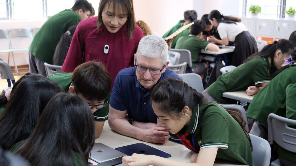 Apple CEO Tim Cook at a visit to a school in Hanoi on April 16, 2024. - Tuan Hung/VNExpress/AP