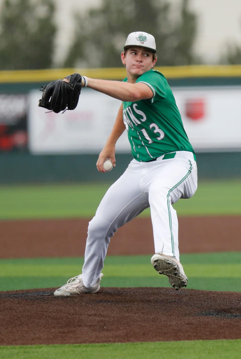 Wall pitcher Dylan Gidney (13) throws in the sixth inning in the third game of a best-of-three Region I-3A semifinal series against Bushland on Saturday, May 27, 2023, at Lubbock-Cooper’s Pirate Field at First United Park.