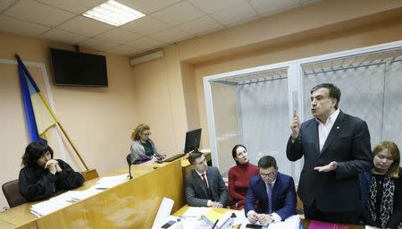 Ukrainian opposition figure and Georgian former President Mikheil Saakashvili (2nd R) speaks during a court hearing in Kiev, Ukraine December 11, 2017. REUTERS/Valentyn Ogirenko