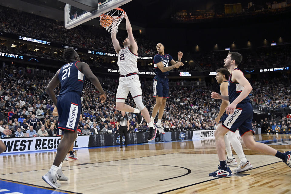 Gonzaga forward Drew Timme (2) dunks in the second half of an Elite 8 college basketball game against UConn in the West Region final of the NCAA Tournament, Saturday, March 25, 2023, in Las Vegas. (AP Photo/David Becker)