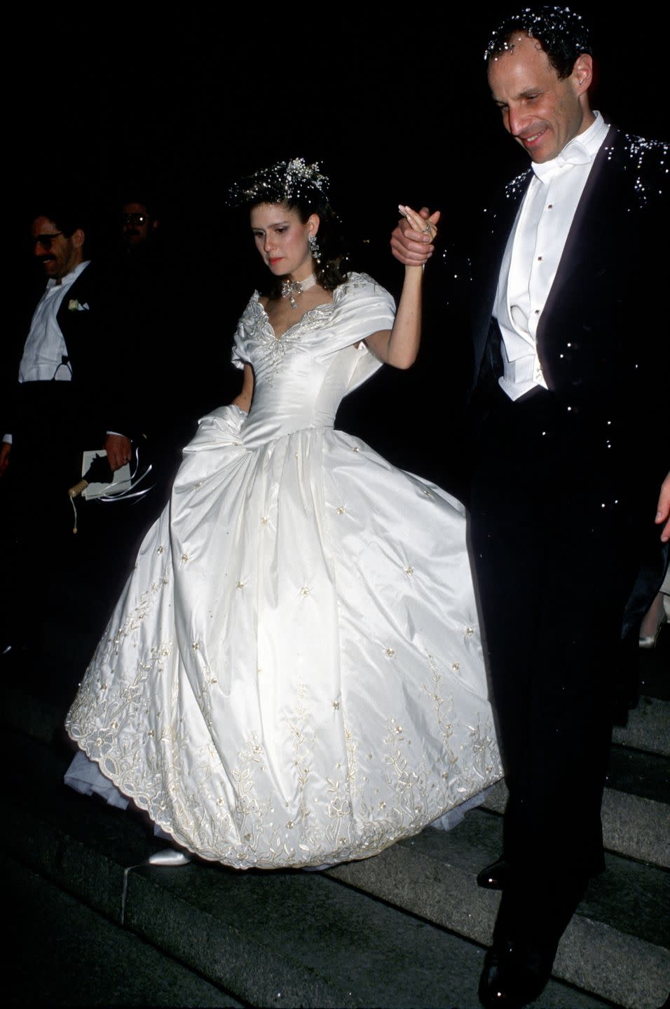 <p>Jonathan Tisch and Laura Steinberg married in 1988 at the Central Synagogue in NYC. Their wedding made the pages of <a href="https://www.nytimes.com/1987/05/03/style/jonathan-tisch-executive-to-marry-laura-steinberg.html" rel="nofollow noopener" target="_blank" data-ylk="slk:The New York Times;elm:context_link;itc:0;sec:content-canvas" class="link "><em>The New York Times</em></a>, obviously, though the couple later divorced. Jonathan's wealth can be traced back to his family's empire of hotels, which now all fall under the Loews Corporation. The American conglomerate has diversified its portfolio to include insurance, oil drilling, and pipeline transport. </p><p>Laura wore an <a href="https://www.nytimes.com/1988/04/19/nyregion/candlelight-wedding-joins-2-billionaire-families.html" rel="nofollow noopener" target="_blank" data-ylk="slk:off-white taffeta dress;elm:context_link;itc:0;sec:content-canvas" class="link ">off-white taffeta dress</a> that was delicately embroidered in gold and had a seven-foot train. Her tulle veil was held in place by a diamond and pearl tiara. Meanwhile, her matron of honor and bridesmaids all wore dresses by Arnold Scaasi. As reported by <em>The New York Times,</em> "The families declined a request by <em>Life </em>magazine to document what was being called the wedding of the 80s." More than 500 guests attended the wedding, including the likes of Barbara Walters and Helen Gurley Brown. </p>