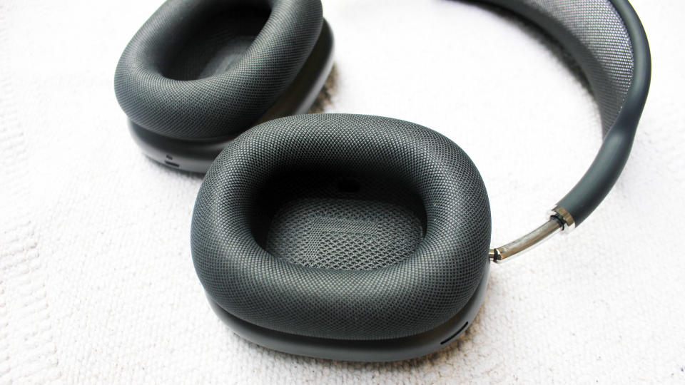 A close up of the earcups of the Apple AirPods Max headphones