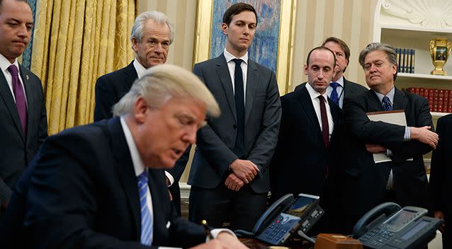 White House chief-of-staff Reince Priebus (far left) and Bannon (far right). Source: AP