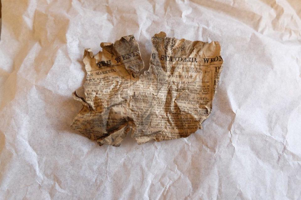 A copy of the Evening Standard from 1889 found under floorboards at Buckingham Palace (Buckingham Palace)