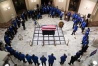 <p>Members of the Phi Beta Sigma Fraternity, of which Lewis was a member, surrounded the Congressman's flag-draped casket at the Georgia State Capitol. </p>