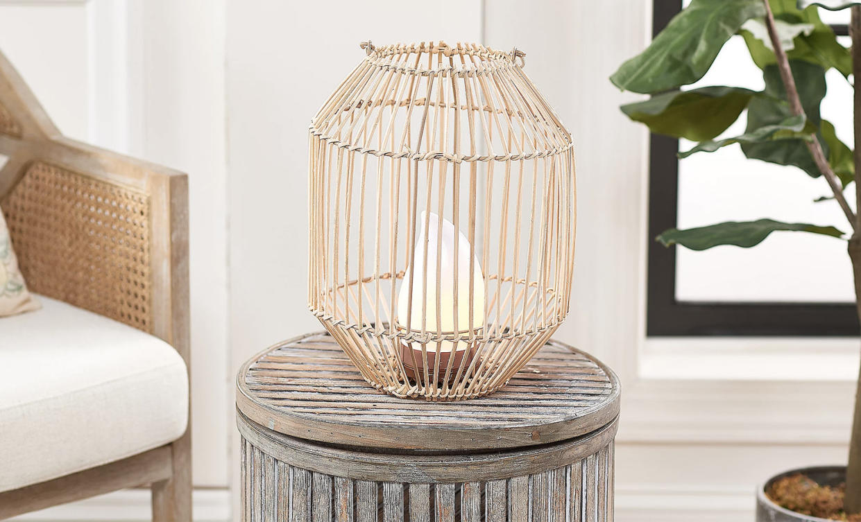 Woven rattan lamp on outdoor table