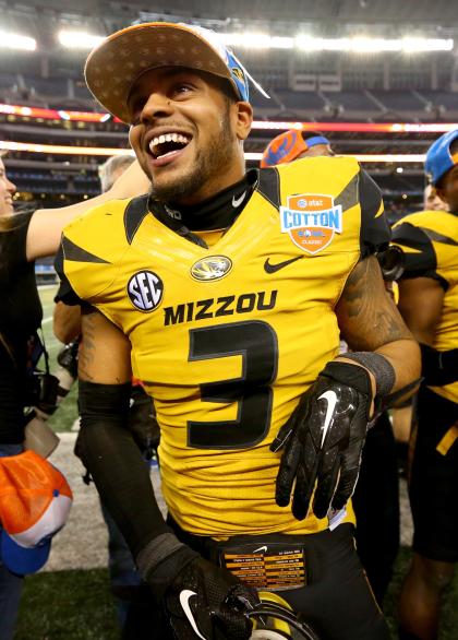 ARLINGTON, TX - JANUARY 03: David Johnson #3 of the Missouri Tigers celebrates after the Tigers defeat the Oklahoma State Cowboys 41-31 during the AT&T Cotton Bowl on January 3, 2014 in Arlington, Texas. (Photo by Ronald Martinez/Getty Images)