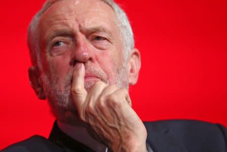 Britain's Labour Party Leader Jeremy Corbyn sits on stage at the annual Labour Party Conference in Liverpool, Britain, September 23, 2018. REUTERS/Hannah McKay