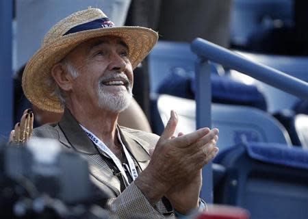 Actor Sean Connery awaits the start of the U.S. Open men's final match between Serbia's Novak Djokovic and Britain's Andy Murray in New York, September 10, 2012. REUTERS/Adam Hunger/Files