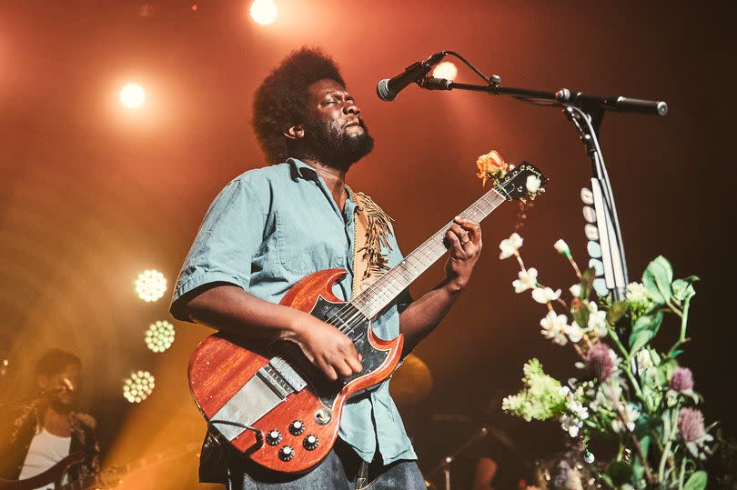 Michael Kiwanuka performing on stage in Spain in 2022