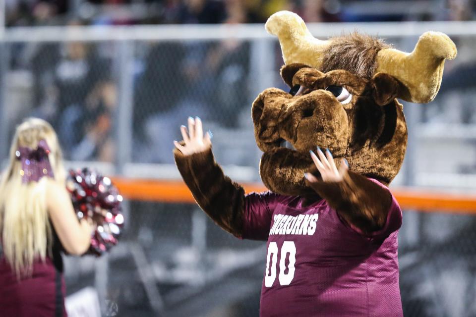 Bronte's mascot dances with the cheerleaders during the game against Robert Lee Friday, Oct. 26, 2018, in Robert Lee.