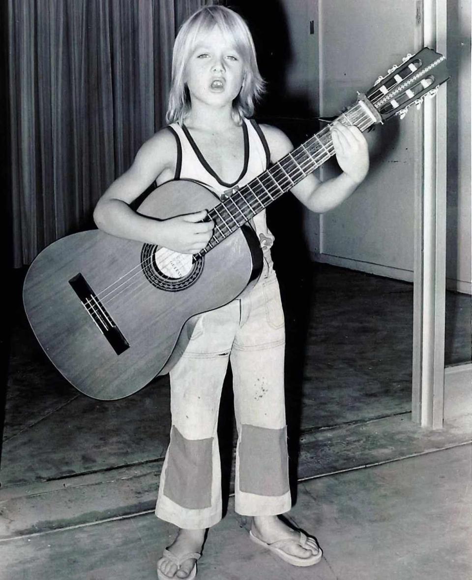 <p>Can you guess who this mop-topped future musician is? Find out and <a href="https://people.com/celebrity/celebrity-baby-photos/?" rel="nofollow noopener" target="_blank" data-ylk="slk:guess even more celeb kids from the throwback photos here" class="link ">guess even more celeb kids from the throwback photos here</a>. </p>