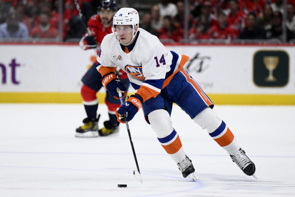 New York Islanders center Bo Horvat (14) skates with the puck during the first period of an NHL hockey game against the Washington Capitals, Wednesday, March 29, 2023, in Washington. (AP Photo/Nick Wass)