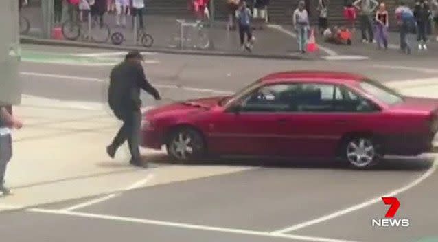 A teenage boy tried desperately to bring the Holden Commodore to a halt. Source: 7 News