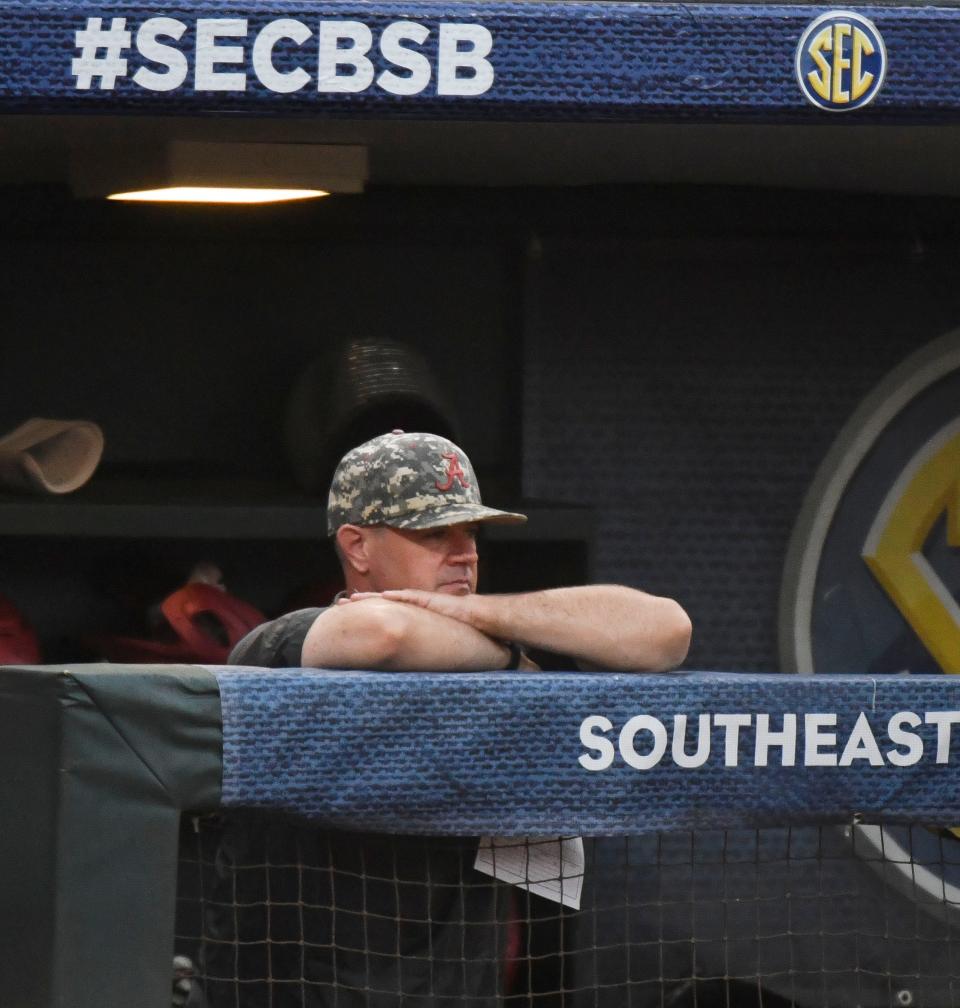 Alabama interim head coach Jason Jackson watches his team play against Florida during the second round of the SEC Baseball Tournament at the Hoover Met Wednesday, May 24, 2023.  