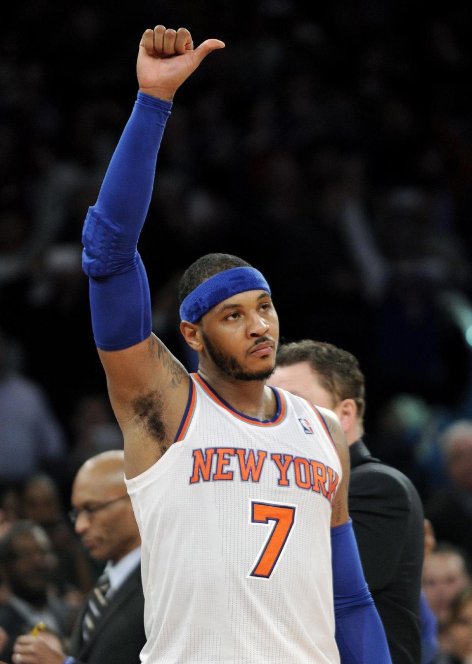 New York Knicks' Carmelo Anthony reacts to the fans after scoring 62 points and coming out of an NBA basketball game during the fourth quarter against the Charlotte Bobcats Friday, Jan. 24, 2014, at Madison Square Garden in New York. The Knicks won 125-96. (AP Photo/Bill Kostroun)