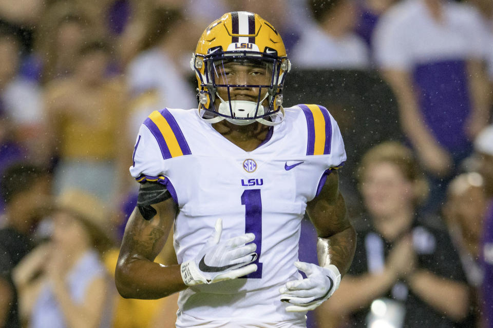 FILE - In this Saturday, Oct. 2, 2021, file photo, LSU cornerback Eli Ricks (1) runs on the field during an NCAA college football game against Auburn in Baton Rouge, La., Oct. 2, 2021. Ricks, a transfer from LSU, is among four players from the top-ranked Crimson Tide selected to The Associated Press preseason All-America team, Monday, Aug. 22, 2022. (AP Photo/Matthew Hinton, File)