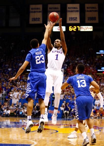 LAWRENCE, KS - JANUARY 30:  Wayne Selden Jr. #1 of the Kansas Jayhawks shoots over Jamal Murray #23 of the Kentucky Wildcats during the game at Allen Fieldhouse on January 30, 2016 in Lawrence, Kansas.  (Photo by Jamie Squire/Getty Images)