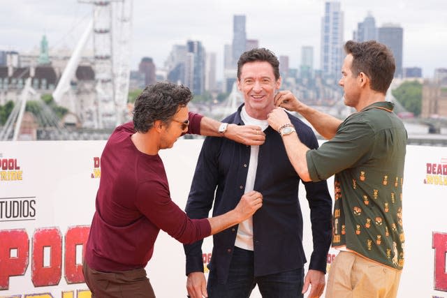 Jackman, Reynolds and Levy fooling around at the Deadpool and Wolverine photo call