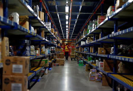 An employees works at RedMart's fulfillment centre in Singapore September 22, 2017. REUTERS/Edgar Su