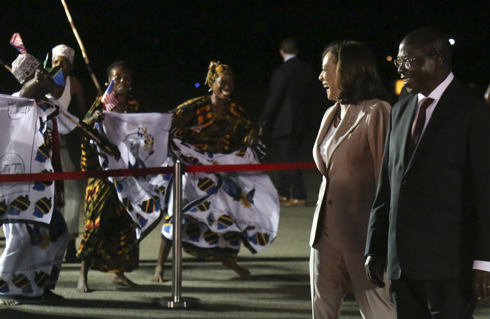 Vice President Kamala Harris talks with Tanzania's Vice President Philip Mpango as she arrives at the Julius Nyerere Airport in Dar es Salaam, Tanzania, Wednesday, March 29, 2023, the second stop of a three-nation tour of Africa. (Emmanuel Herman/Pool Photo via AP)