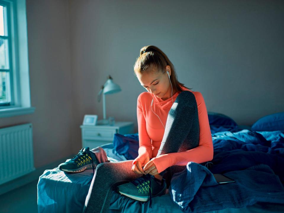 A woman preparing to workout.