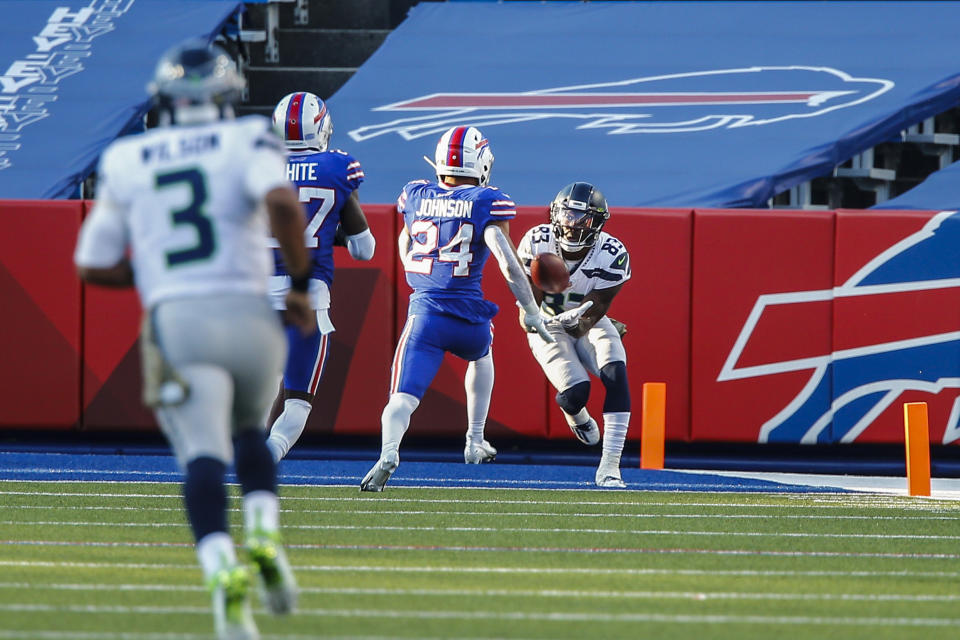 Seattle Seahawks wide receiver David Moore (83) catches a pass from quarterback Russell Wilson (3) for a touchdown during the second half of an NFL football game against the Buffalo Bills, Sunday, Nov. 8, 2020, in Orchard Park, N.Y. (AP Photo/John Munson)