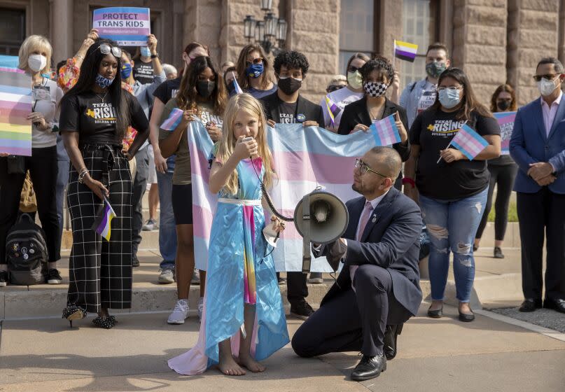 Kai Shappley, 10, of Austin, speaks at a rally against House Bill 25, a bill that would ban transgender girls from participating in girls school sports, outside the Capitol in Austin, Texas, on Wednesday, Oct. 6, 2021. (Jay Janner/Austin American-Statesman via AP)