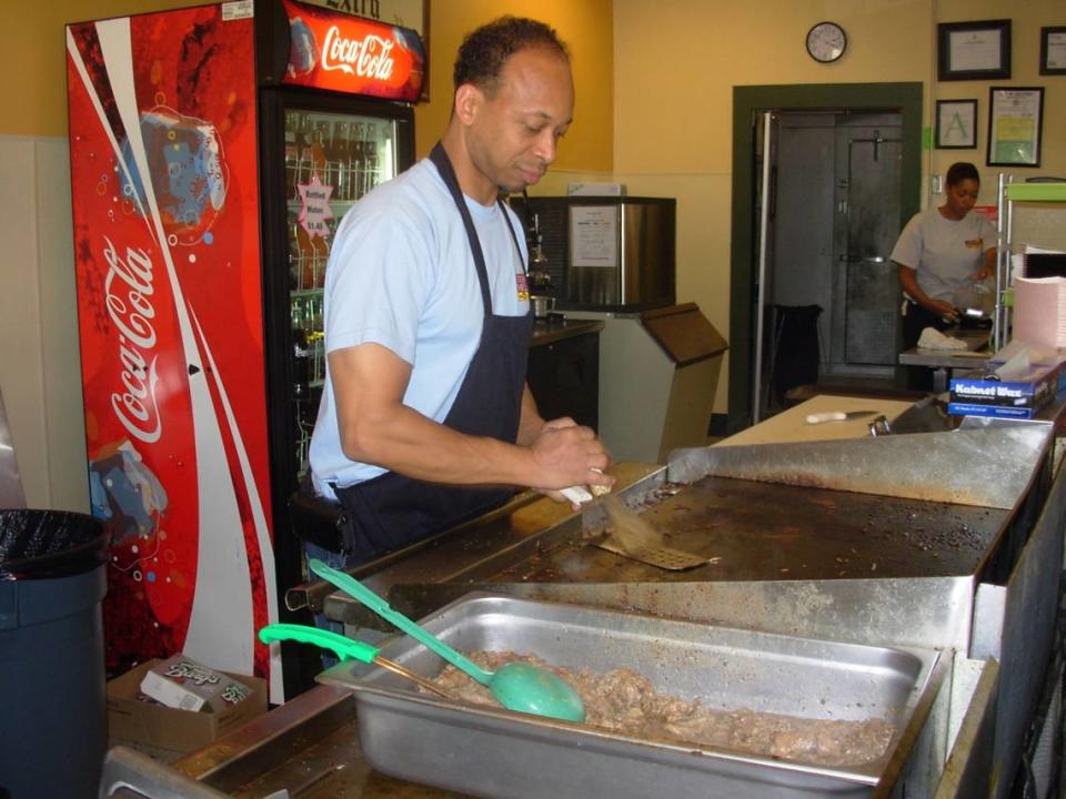 Tony Nelson works at the grill at his restaurant, Tony Nelson’s King of Philly Cheese Steaks, on Pass Road in Gulfport in this 2011 file photo. Tammy Smith/Sun Herald file